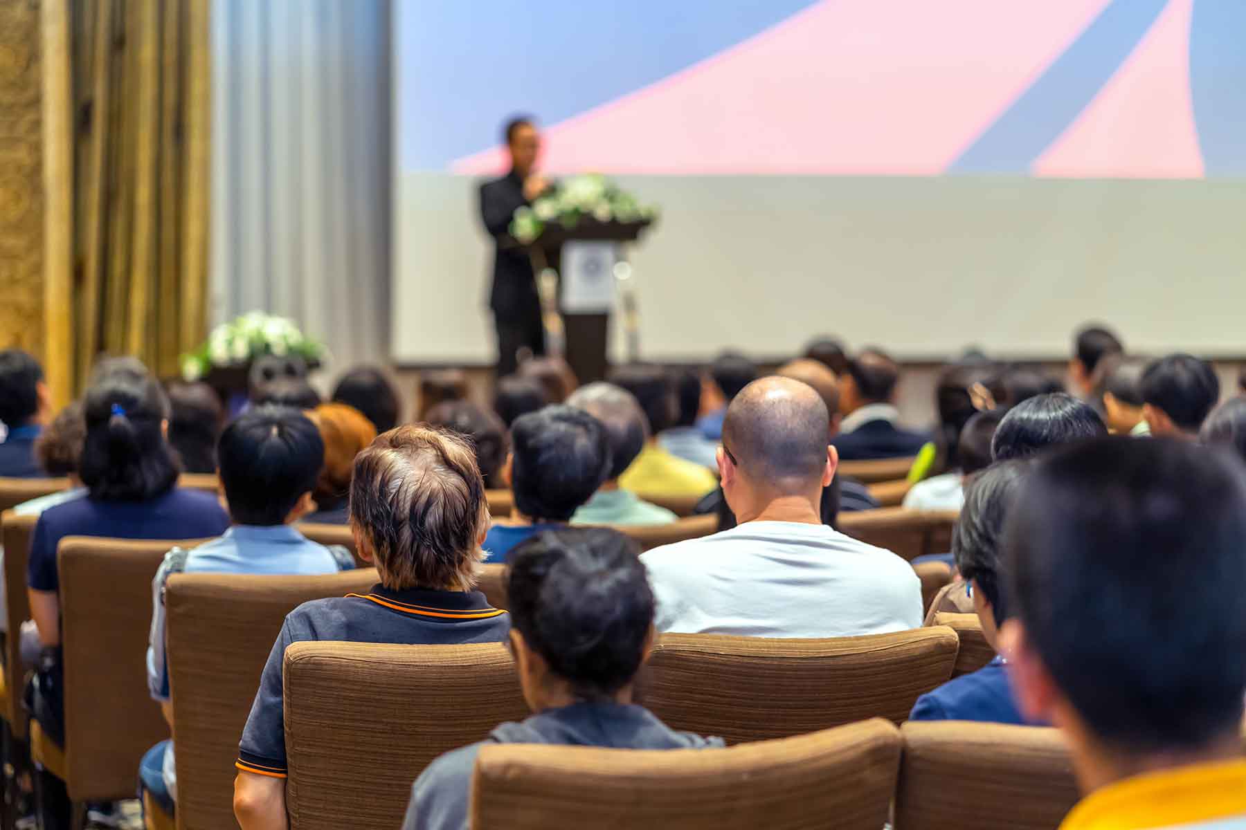 back-side-of-audience-listening-the-speaker-with-p-7UZ3WDL.jpg